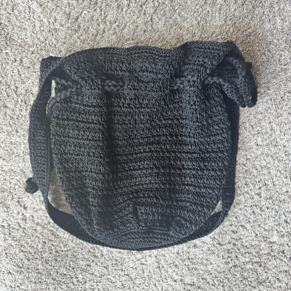 THE SAK Crochet Drawstring Purse Backpack Black Bucket Handbag Excellent